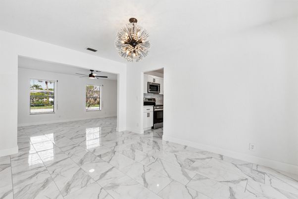 Chandelier, Empty room, Interior, Kitchen, Marble, Stainless Steel Appliances