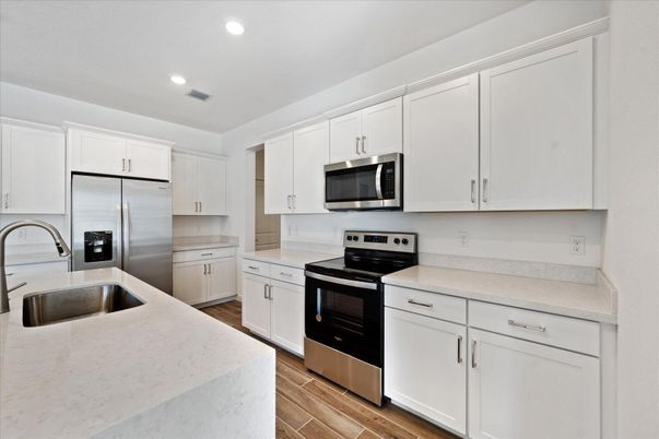Interior, Kitchen, Recessed Lighting, Stainless Steel Appliances, Wood Texture Flooring