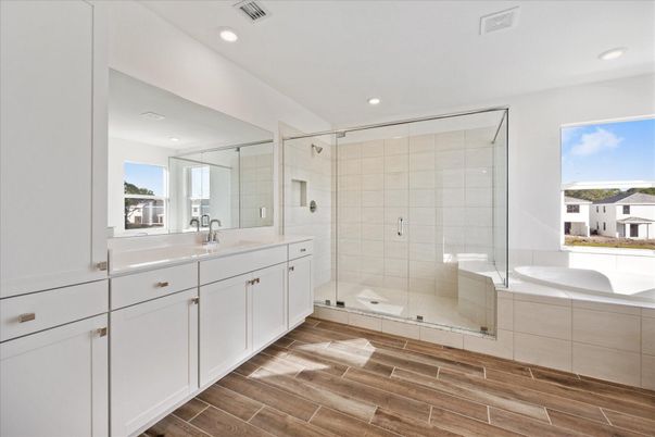 Bathroom, Dual Sink Vanities, Glass Shower, Interior, Recessed Lighting, Wood Texture Flooring