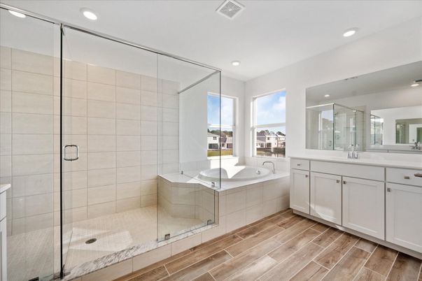 Bathroom, Dual Sink Vanities, Glass Shower, Interior, Recessed Lighting, Wood Texture Flooring