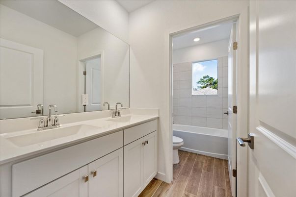 Bathroom, Dual Sink Vanities, Interior, Recessed Lighting, Wood Texture Flooring