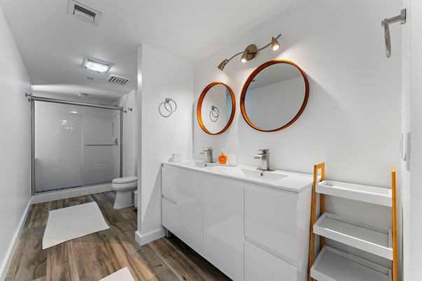 Bathroom, Dual Sink Vanities, Glass Shower, Interior, Wood Texture Flooring
