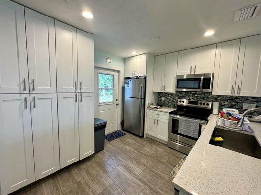 Interior, Kitchen, Recessed Lighting, Stainless Steel Appliances, Wood Texture Flooring