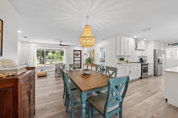 Chandelier, Dining room, Interior, Kitchen, Recessed Lighting, Stainless Steel Appliances, Wood Texture Flooring