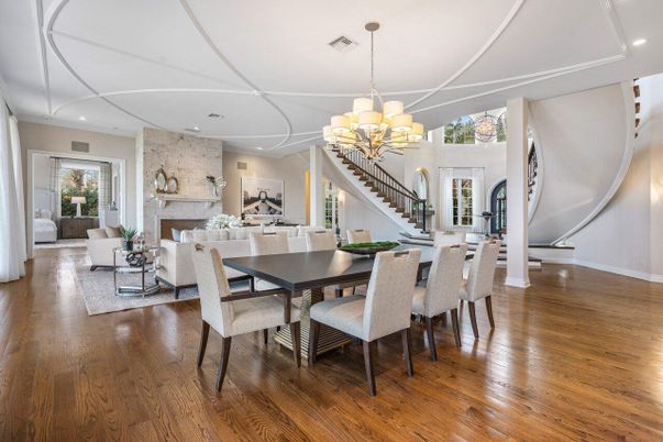 Chandelier, Dining room, Fireplace, Interior, Living room, Recessed Lighting, Stone Walls, Wood Texture Flooring