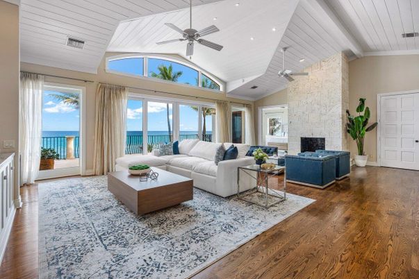 Fireplace, Interior, Living room, Recessed Lighting, Stone Walls, Water, Wood Texture Flooring