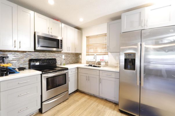 Interior, Kitchen, Recessed Lighting, Stainless Steel Appliances, Wood Texture Flooring