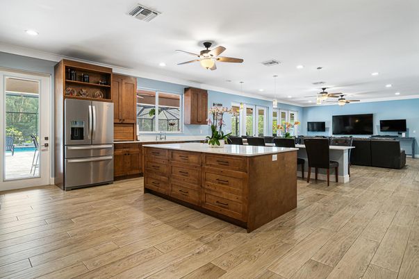 Dining room, Interior, Kitchen, Pendant Lights, Recessed Lighting, Stainless Steel Appliances, Wood Texture Flooring