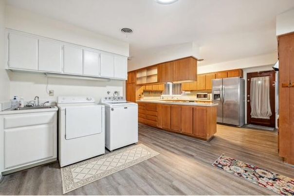 Interior, Kitchen, Recessed Lighting, Stainless Steel Appliances, Washer, Wood Texture Flooring