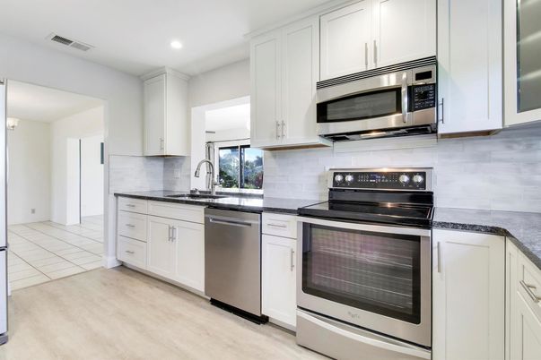 Interior, Kitchen, Recessed Lighting, Stainless Steel Appliances, Wood Texture Flooring