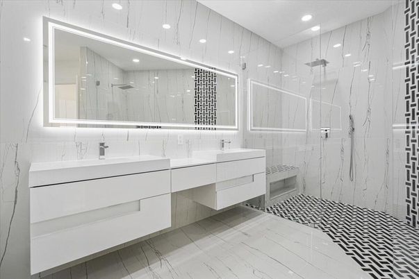 Bathroom, Dual Sink Vanities, Glass Shower, Interior, Marble, Marble Walls, Recessed Lighting