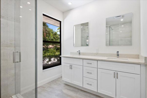 Bathroom, Dual Sink Vanities, Glass Shower, Interior, Recessed Lighting