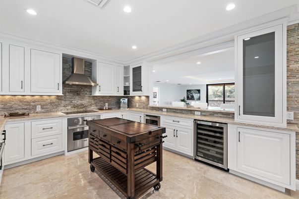 Interior, Kitchen, Recessed Lighting, Stainless Steel Appliances, Stone Walls