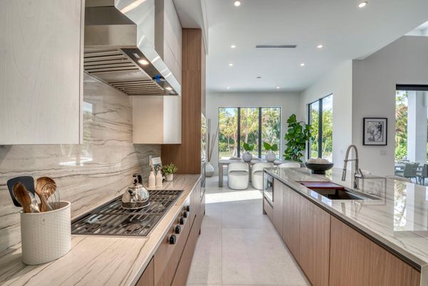 Interior, Kitchen, Marble Walls, Recessed Lighting, Stainless Steel Appliances