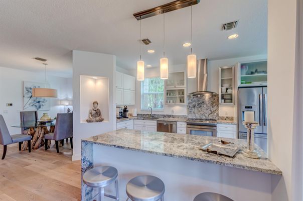 Dining room, Interior, Kitchen, Pendant Lights, Recessed Lighting, Stainless Steel Appliances, Wood Texture Flooring