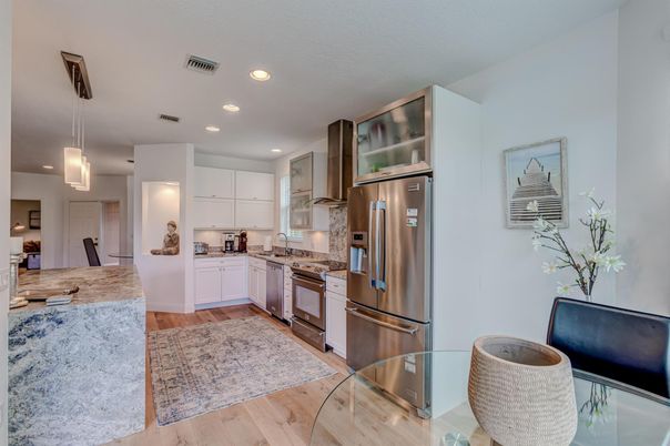 Interior, Kitchen, Pendant Lights, Recessed Lighting, Stainless Steel Appliances, Wood Texture Flooring