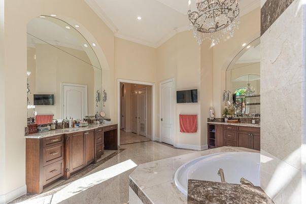 Bathroom, Chandelier, Dual Sink Vanities, Interior, Recessed Lighting, Wood Texture Flooring