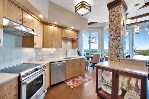 Dining room, Interior, Kitchen, Pendant Lights, Recessed Lighting, Stainless Steel Appliances, Water, Wood Texture Flooring