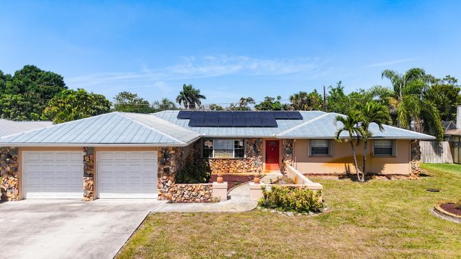 Attached, Exterior, Facade, Solar Panels, Ranch