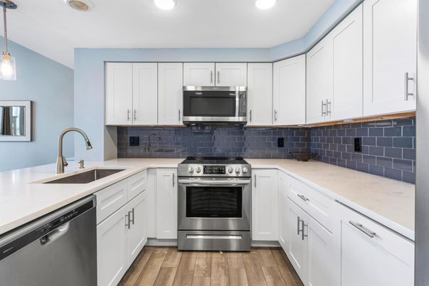 Interior, Kitchen, Pendant Lights, Recessed Lighting, Stainless Steel Appliances, Wood Texture Flooring