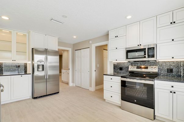 Interior, Kitchen, Recessed Lighting, Stainless Steel Appliances, Wood Texture Flooring