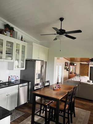 Dining room, Interior, Kitchen, Living room, Stainless Steel Appliances, Wood Texture Flooring
