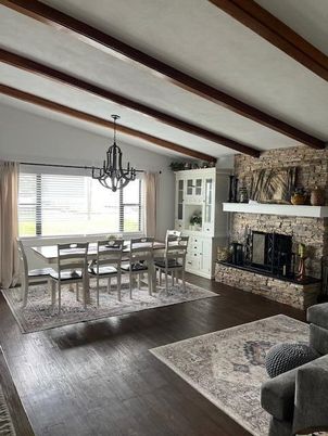 Chandelier, Dining room, Fireplace, Interior, Stone Walls, Wooden Beams, Wood Texture Flooring