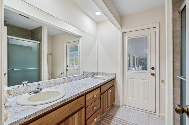 Bathroom, Dual Sink Vanities, Interior, Recessed Lighting, Tile Countertops