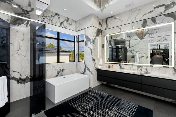 Bathroom, Dual Sink Vanities, Glass Shower, Interior, Marble Walls, Recessed Lighting