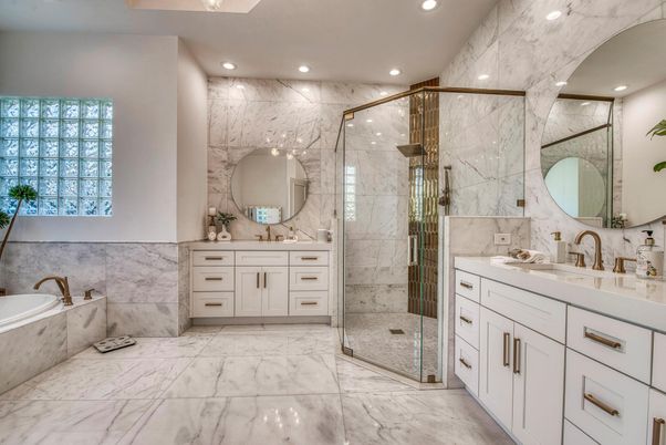 Bathroom, Dual Sink Vanities, Glass Shower, Interior, Marble, Marble Walls, Recessed Lighting