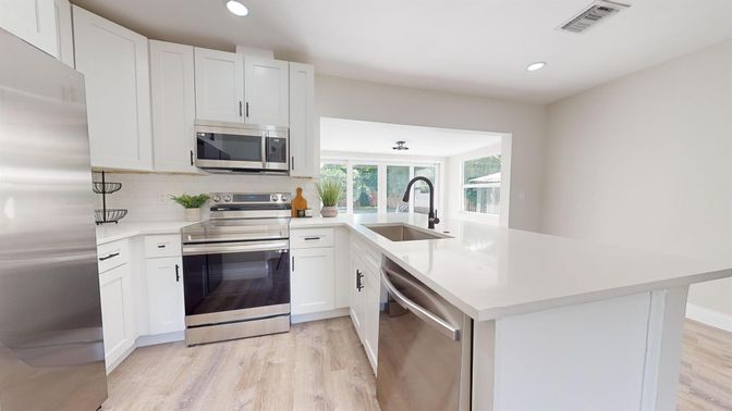 Interior, Kitchen, Recessed Lighting, Stainless Steel Appliances, Wood Texture Flooring