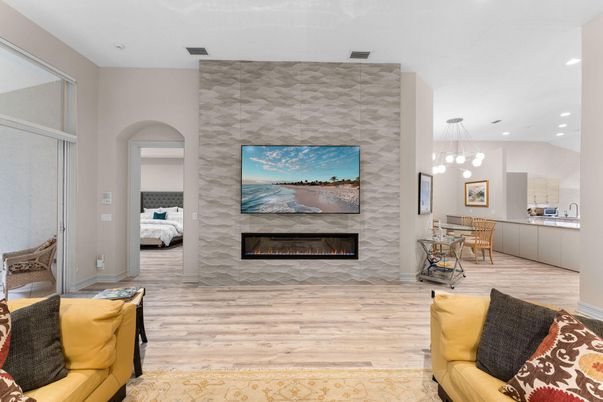 Bedroom, Dining room, Fireplace, Interior, Pendant Lights, Recessed Lighting, Stone Walls, Wood Texture Flooring