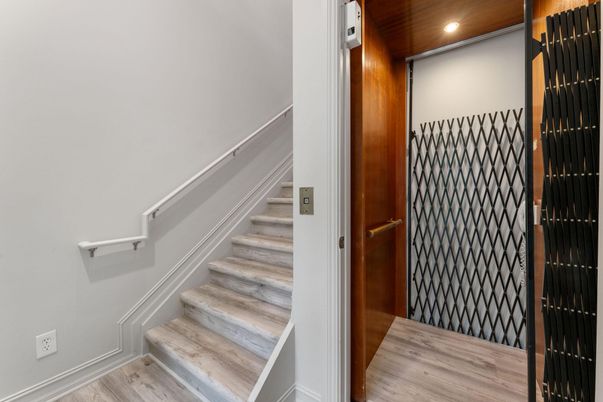 Elevator, Interior, Recessed Lighting, Wood Texture Flooring, Wooden Walls