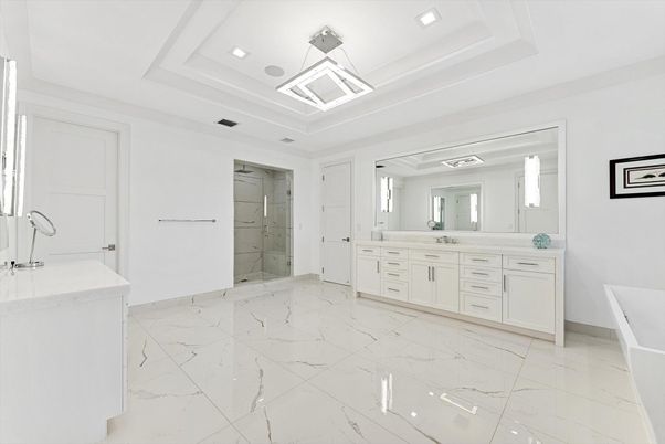 Bathroom, Dual Sink Vanities, Free Standing Baths, Glass Shower, Interior, Marble, Marble Walls, Recessed Lighting