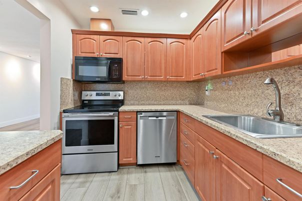Interior, Kitchen, Recessed Lighting, Stainless Steel Appliances, Wood Texture Flooring