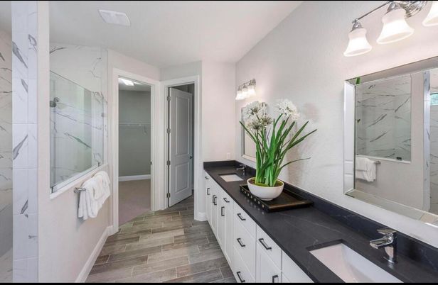 Bathroom, Dual Sink Vanities, Glass Shower, Interior, Marble Walls, Wood Texture Flooring