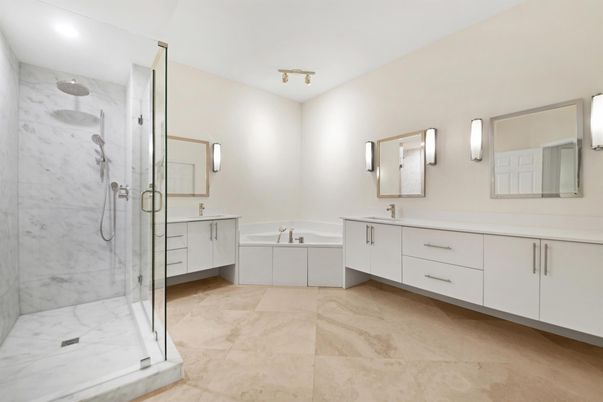 Bathroom, Dual Sink Vanities, Glass Shower, Interior, Marble Walls, Recessed Lighting