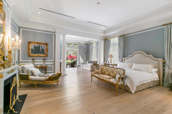 Bedroom, Chandelier, Fireplace, Interior, Recessed Lighting, Wood Texture Flooring