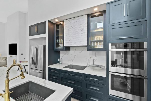 Interior, Kitchen, Marble Walls, Recessed Lighting, Stainless Steel Appliances