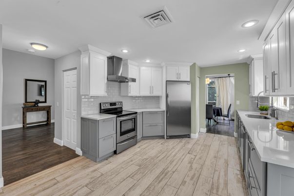 Dining room, Interior, Kitchen, Recessed Lighting, Stainless Steel Appliances, Wood Texture Flooring