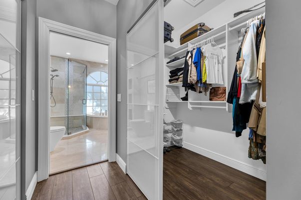 Bathroom, Glass Shower, Interior, Recessed Lighting, Walk-in Closets, Wood Texture Flooring