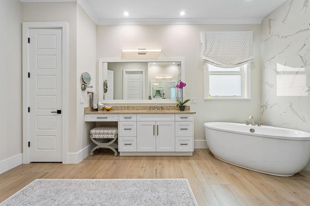 Bathroom, Dual Sink Vanities, Free Standing Baths, Interior, Marble Walls, Recessed Lighting, Wood Texture Flooring
