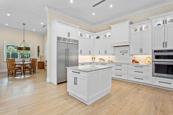 Dining room, Interior, Kitchen, Pendant Lights, Recessed Lighting, Stainless Steel Appliances, Wood Texture Flooring