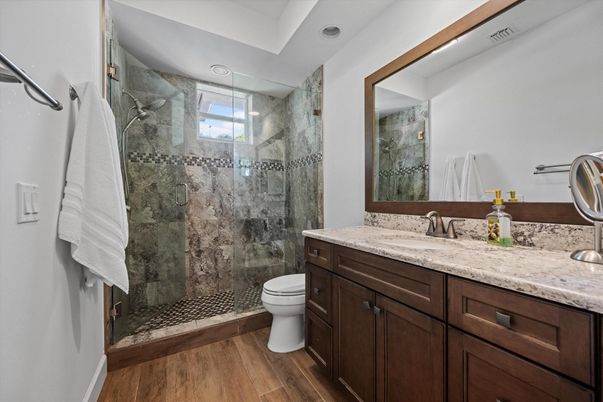 Bathroom, Dual Sink Vanities, Glass Shower, Interior, Wood Texture Flooring