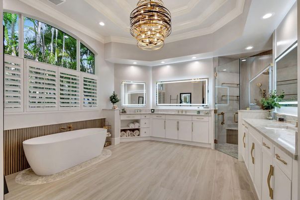 Bathroom, Chandelier, Dual Sink Vanities, Free Standing Baths, Glass Shower, Interior, Recessed Lighting, Wood Texture Flooring