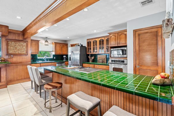 Interior, Kitchen, Recessed Lighting, Stainless Steel Appliances, Tile Countertops