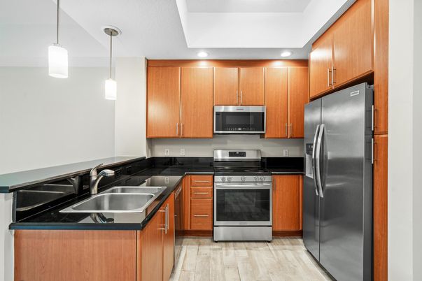 Interior, Kitchen, Pendant Lights, Recessed Lighting, Stainless Steel Appliances, Wood Texture Flooring