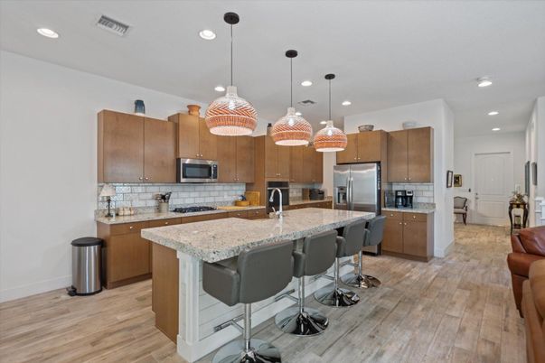 Interior, Kitchen, Pendant Lights, Recessed Lighting, Stainless Steel Appliances, Wood Texture Flooring