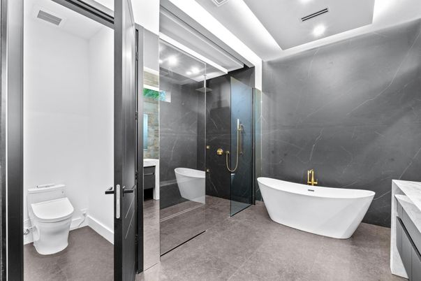 Bathroom, Free Standing Baths, Glass Shower, Interior, Marble Walls, Recessed Lighting
