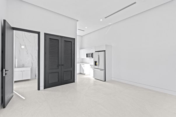 Interior, Kitchen, Marble Walls, Recessed Lighting, Stainless Steel Appliances